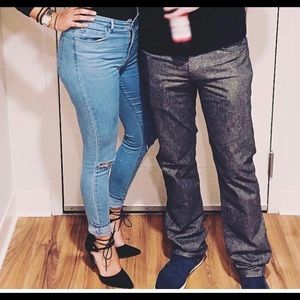 High rise bullhead blue jeans with holes in knees